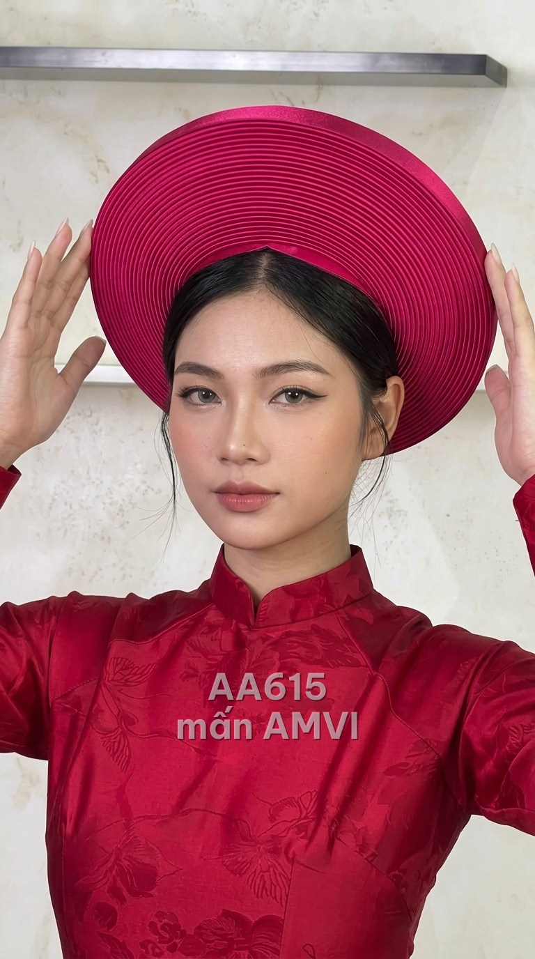 Groom's red áo dài with embroidery for a Vietnamese wedding — khăn đóng headpiece — pink