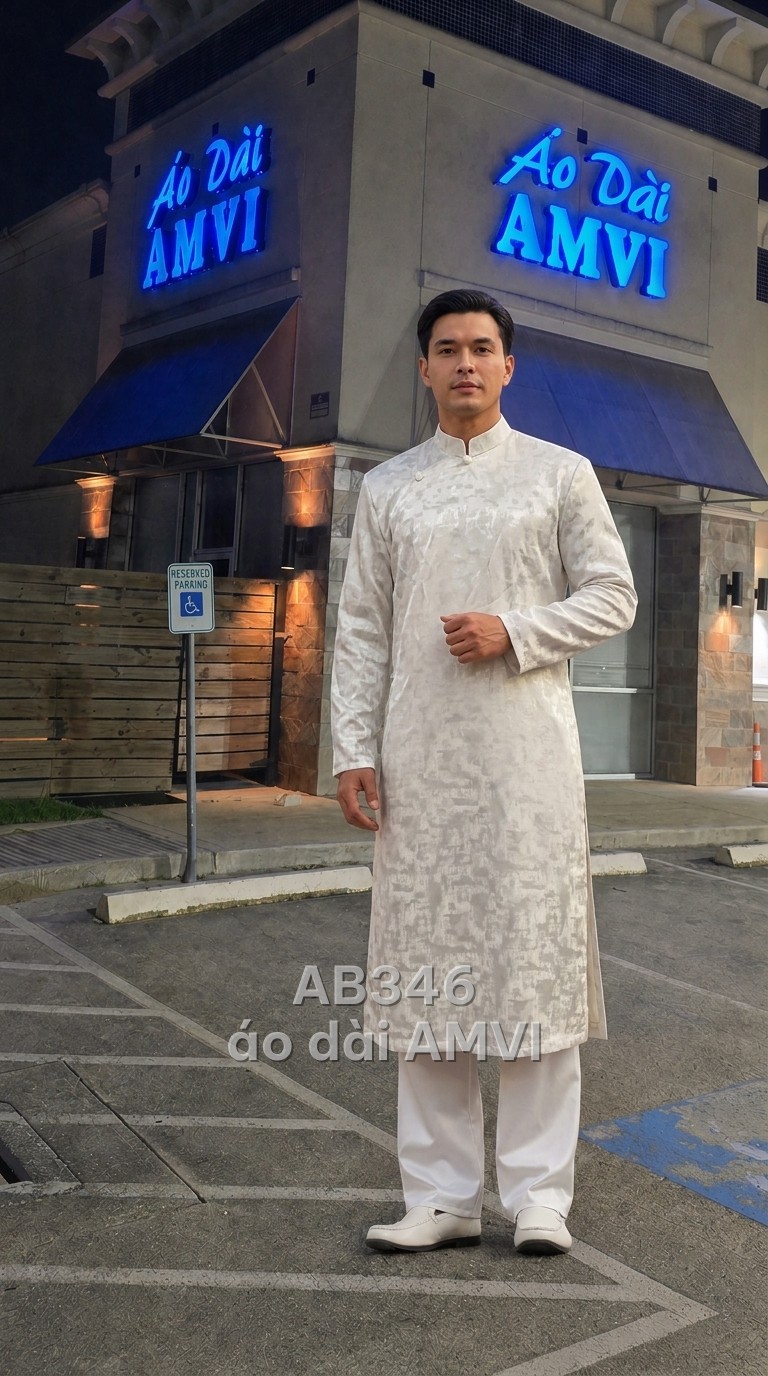 Matching couple áo dài with gold beadwork, a groom and bride in coordinated wedding outfits — groomsman áo dài with embroider