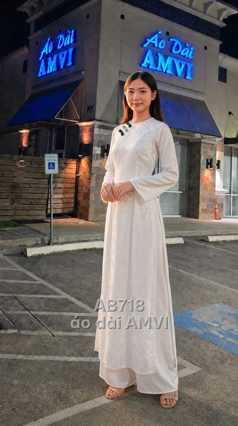 Áo dài nữ đính kết màu xanh của AMVI, mẫu áo dài Tết tại Houston — áo dài cách tân gấm — Trắng